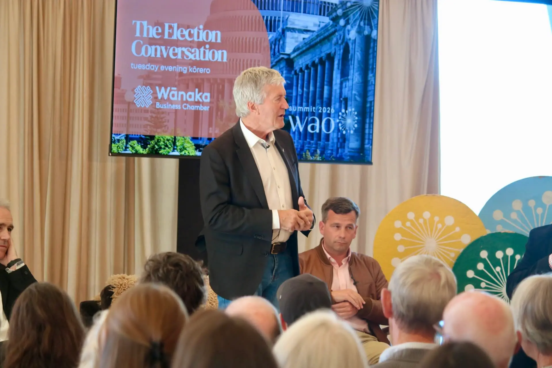 Labour\\'s Waitaki candidate Damien O\\'Connor makes an opening pitch at the Rippon Vineyard hall on Tuesday night. Photo: RNZ