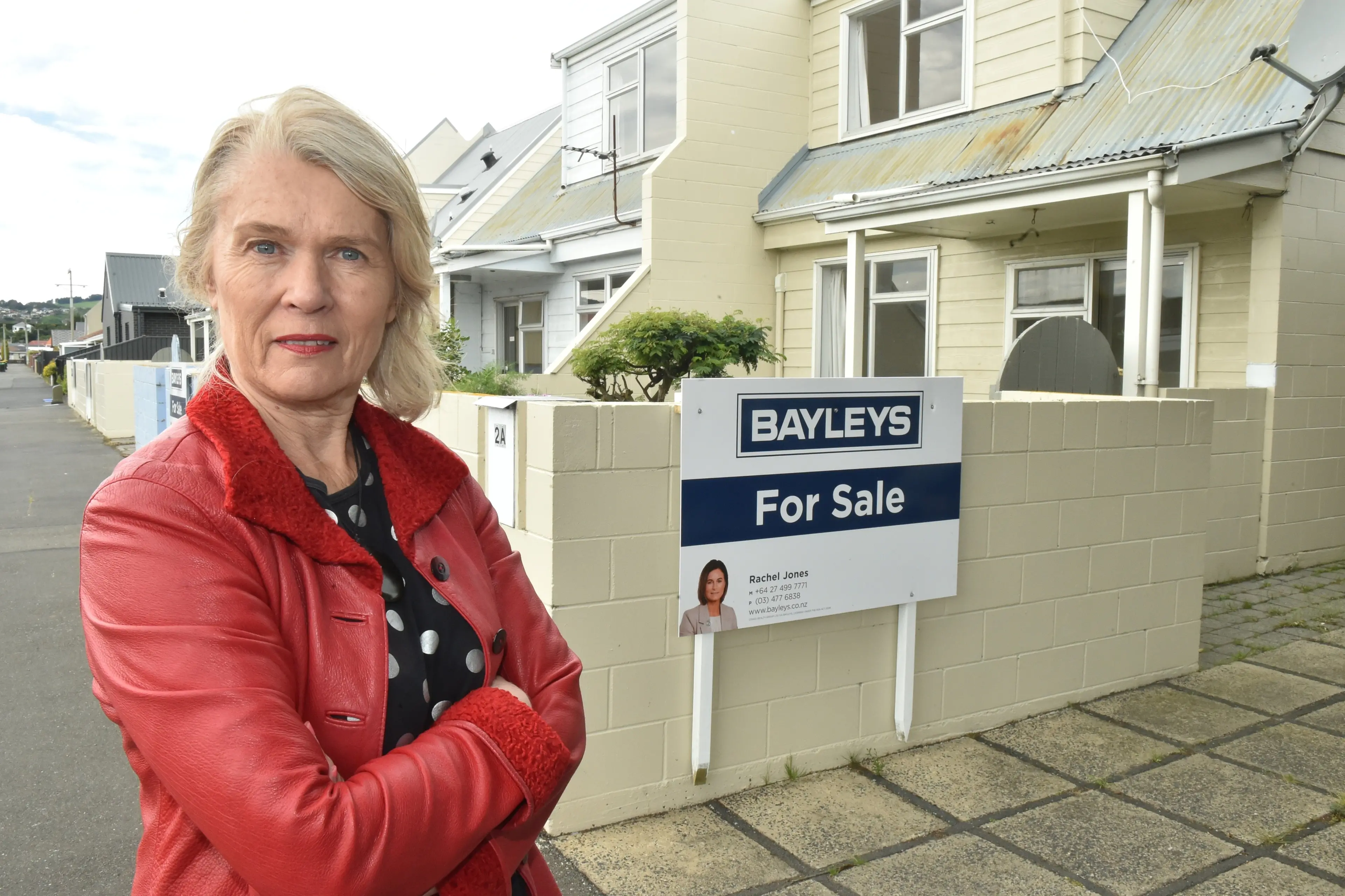 Ingrid Leary outside Kainga Ora homes in Market St. Photo: Gregor Richardson