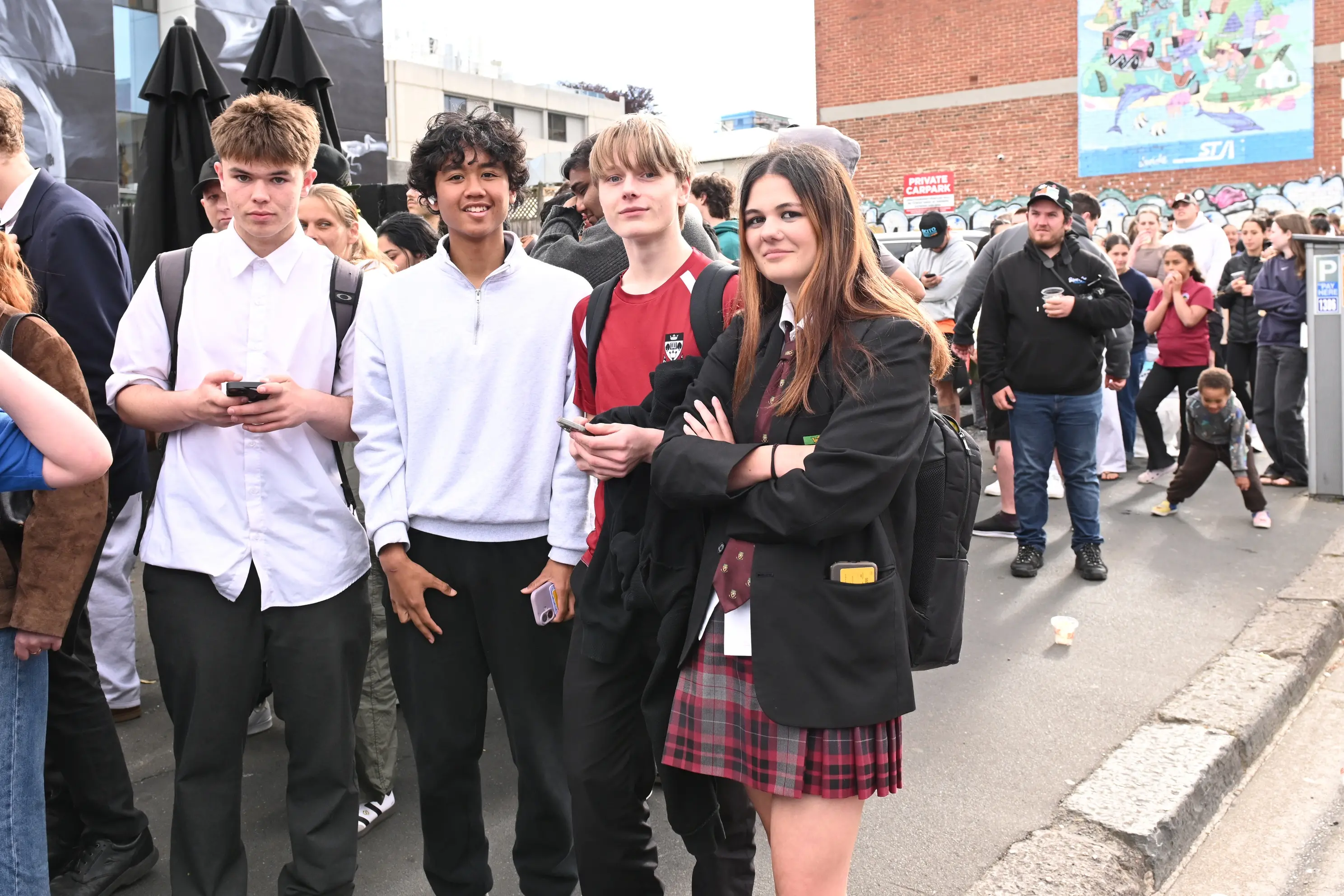 People line up to get free burgers and drink handed out by influencer Jimi Jackson at RE Burger on Wednesday Photo: Linda Robertson