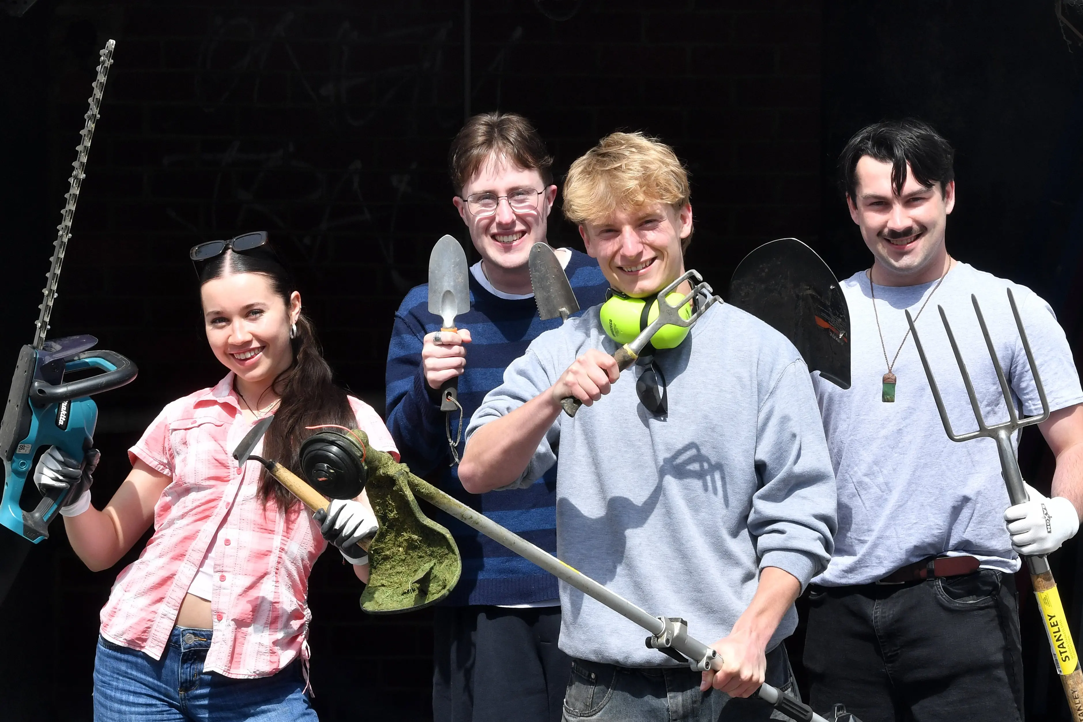Work is growing like weeds for Helpers Dunedin gardeners and University of Otago students (from left) Romy Smith, Harlan Smith, Keltan Voyce and Xander Elphick-Moon, who help city residents with their gardening needs. Photo: Stephen Jaquiery