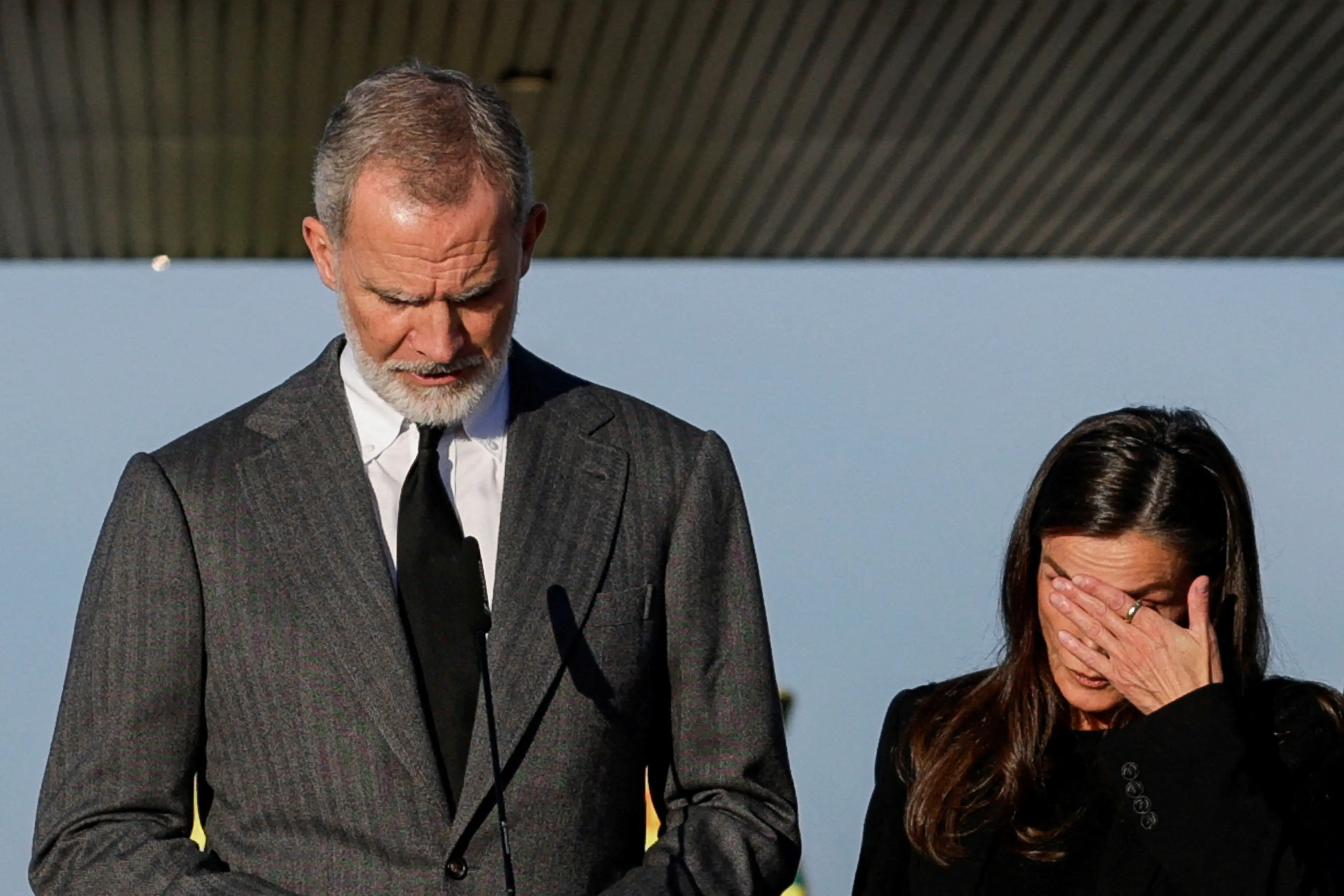 Spain\\'s King Felipe and Queen Letizia outside a hospital where victims are being treated. Photo: Reuters
