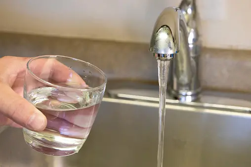 The Greens says the bill would ensure that people could easily check the safety of their public drinking water supply. Photo: Getty Images